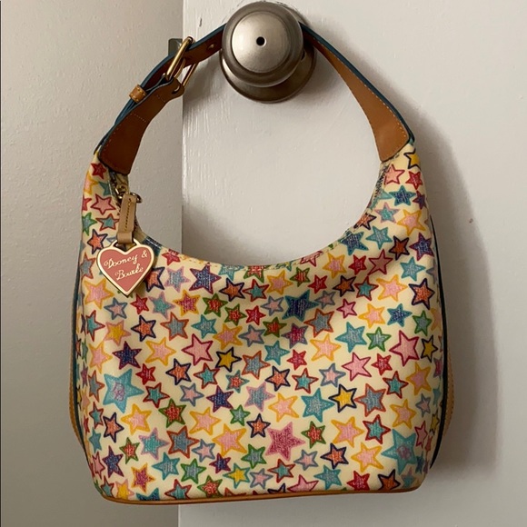 Dooney & Bourke Handbags - Dooney and Bourke Star Print Bucket Bag ⭐️